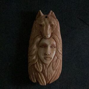 Native American Carved Wolf Clan Girl Pendant 1990s